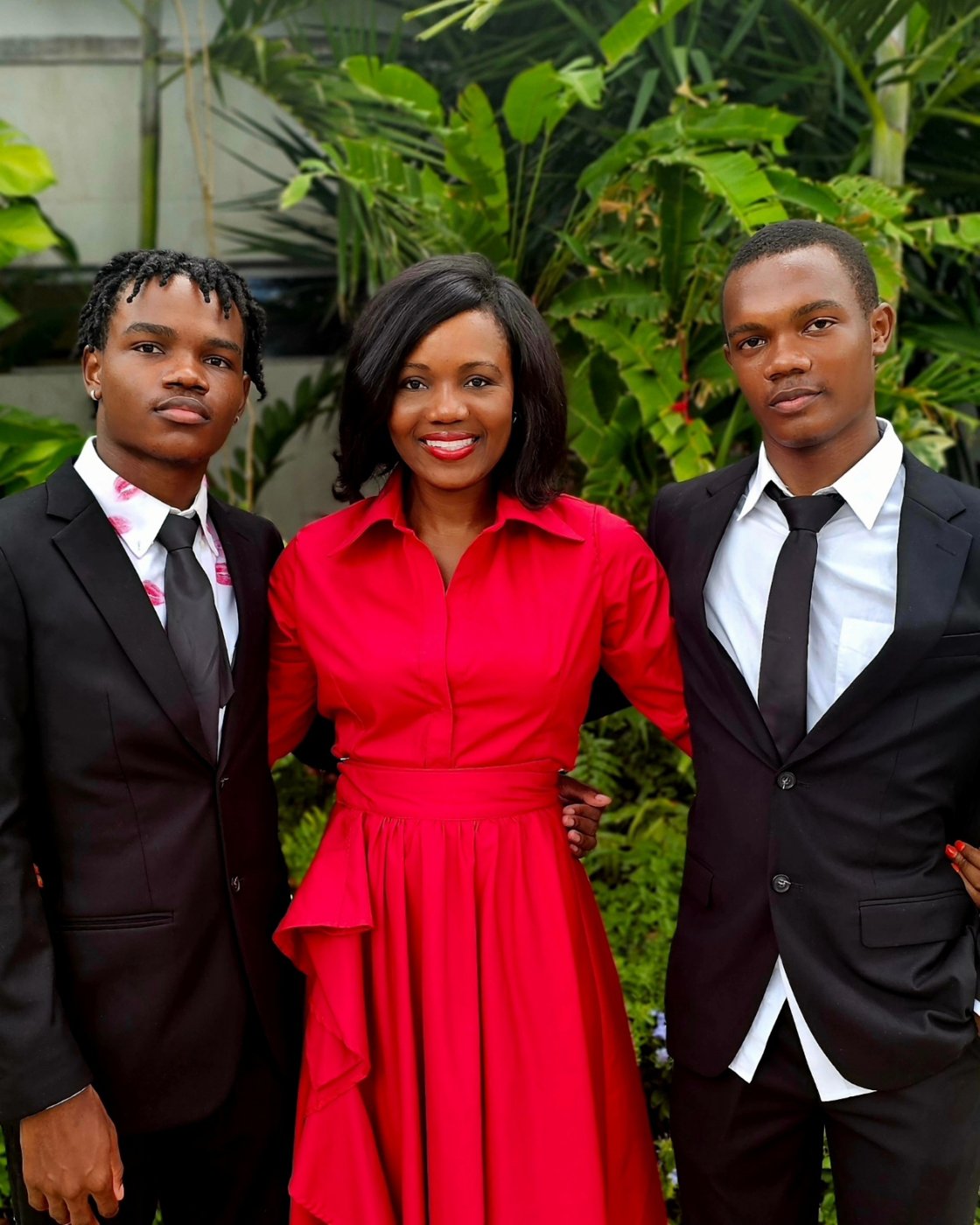 Kadine with her sons, dressed up